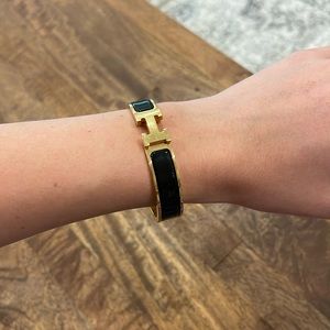 Hermès black and gold Clic H Bracelet